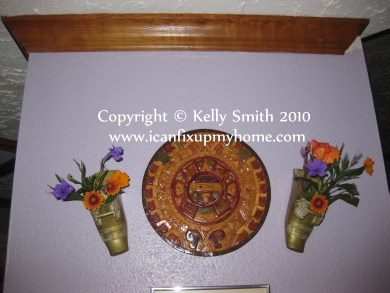 Spanish conquistadores stirrups with flowers as wall art, photo courtesy of Kelly Smith