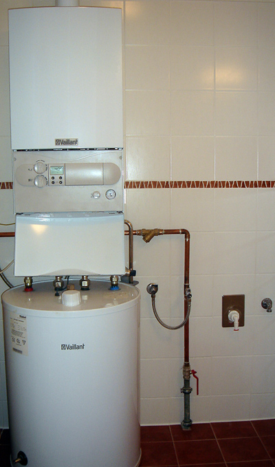 A typical tank hot water heater; photo courtesy Andy Butkaj