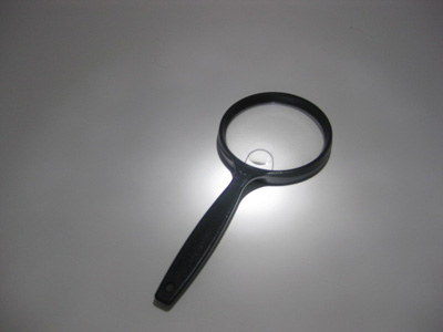 A spy’s magnifying glass; photo copyright Endofskull